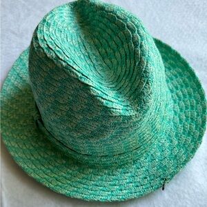 Brand new  never worn. This acqua green fedora will make make heads turn